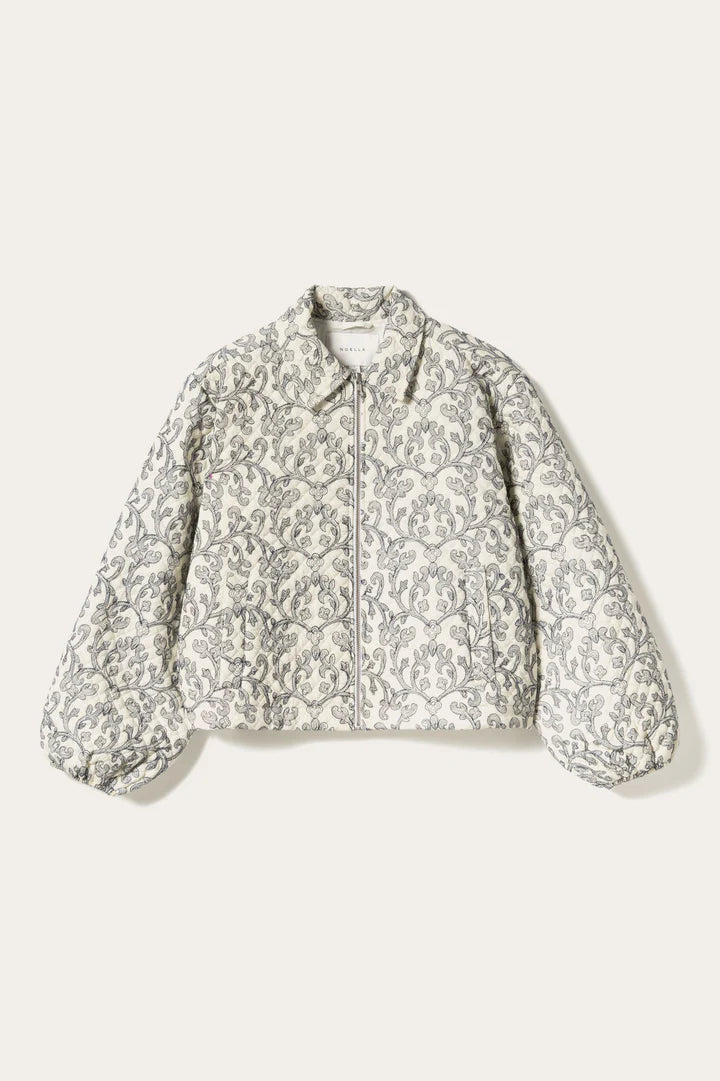 Noella Mariam Jacka, Benvit / Svart