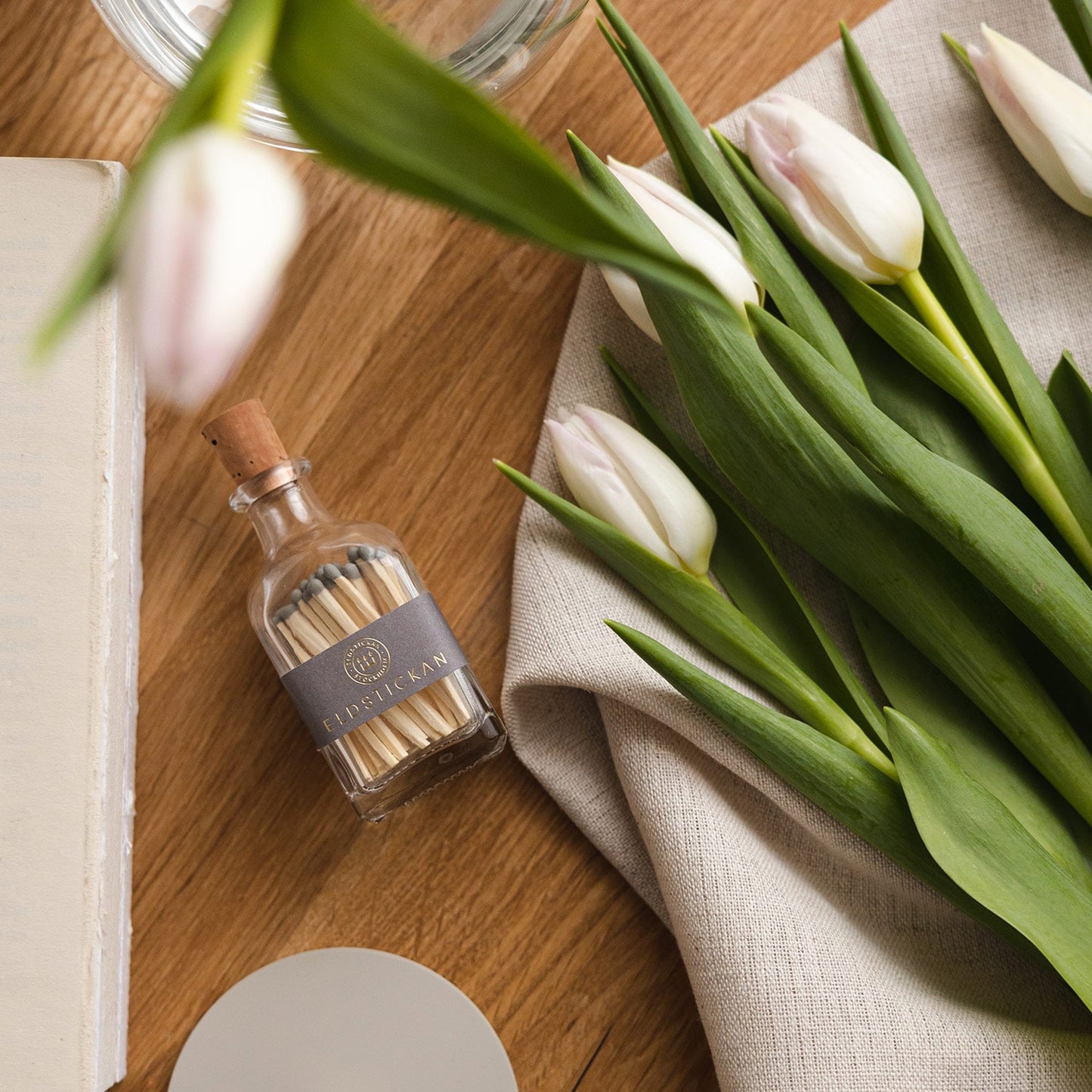 Lilla Tändsticksburk, Aska